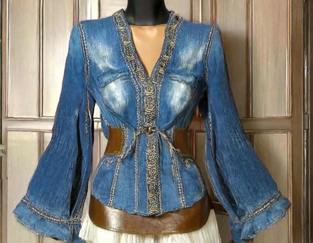 Jean pants upcycled into a blouse with leather waist strap and braided designs